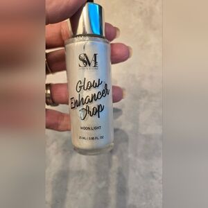 Gloss Enhancer Drops Highlighter Or Brightener About Half Full. Moonlight.